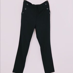 Fitted black pants with side pocket buttons